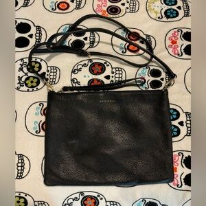 Coccinelle black leather cross body bag with gold hardware